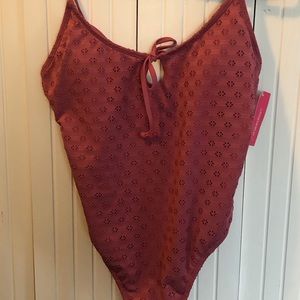 One piece high cut bathing suit.